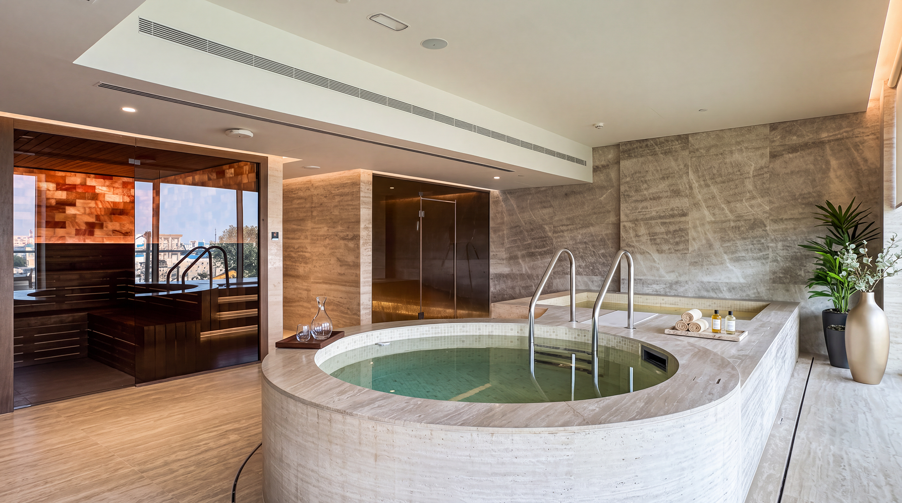 Indoor circular wellness pool and spa suite